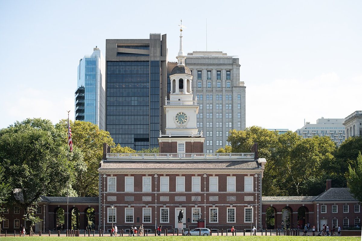Independence Hall's red brick facade and white steeple in Philadelphia's Old City