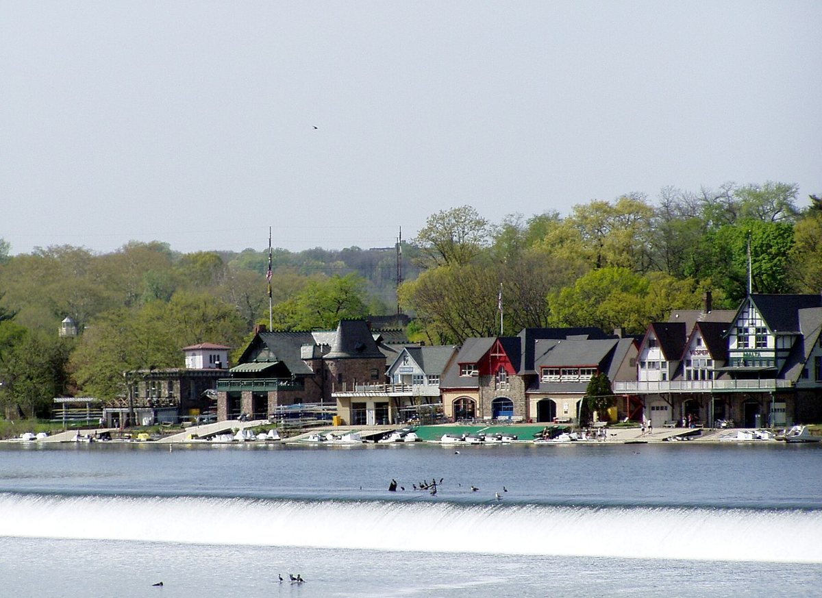 Boathouse Row lit up at night along the Schuylkill River